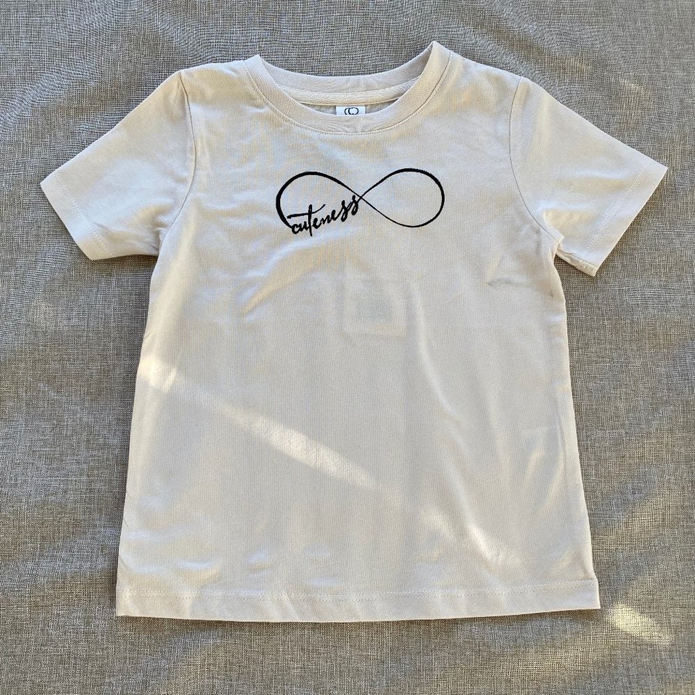CUTENESS INFINITY TEE IN BLACK